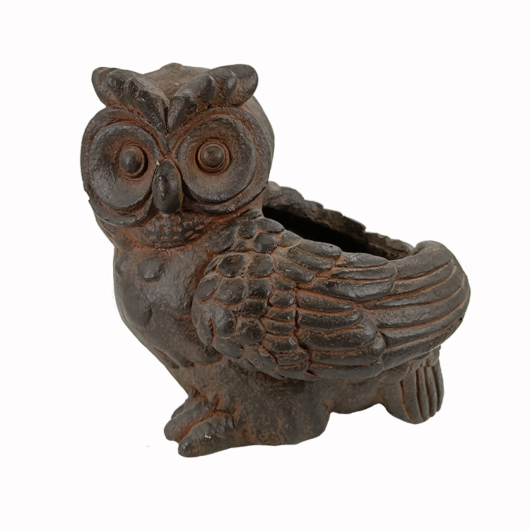 Rusty iron owl flower jar